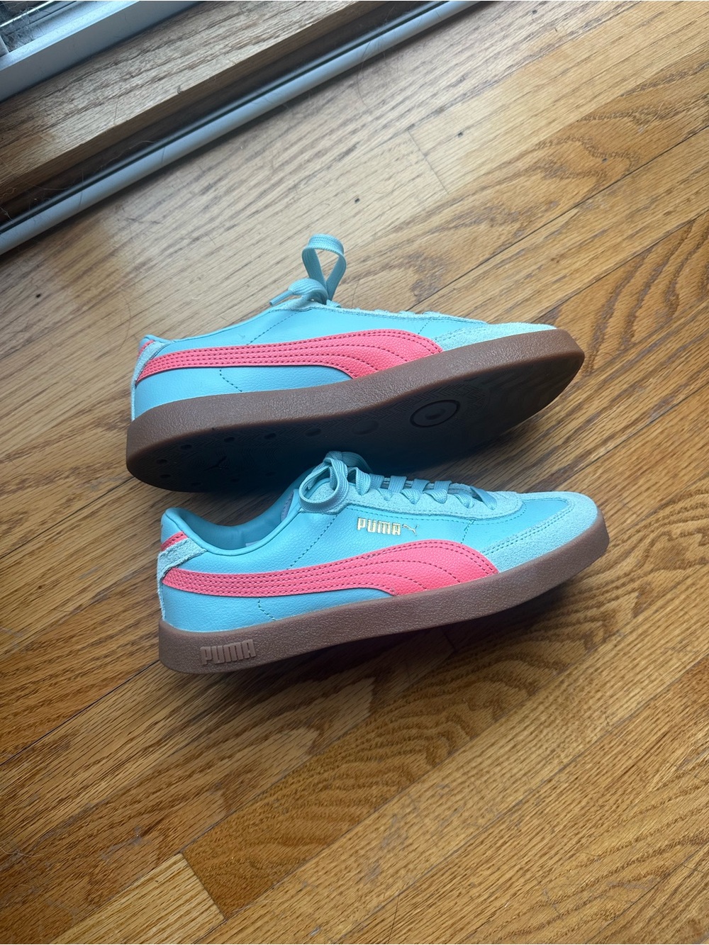 Puma womens Light Blue Sneakers with Pink Stripe
